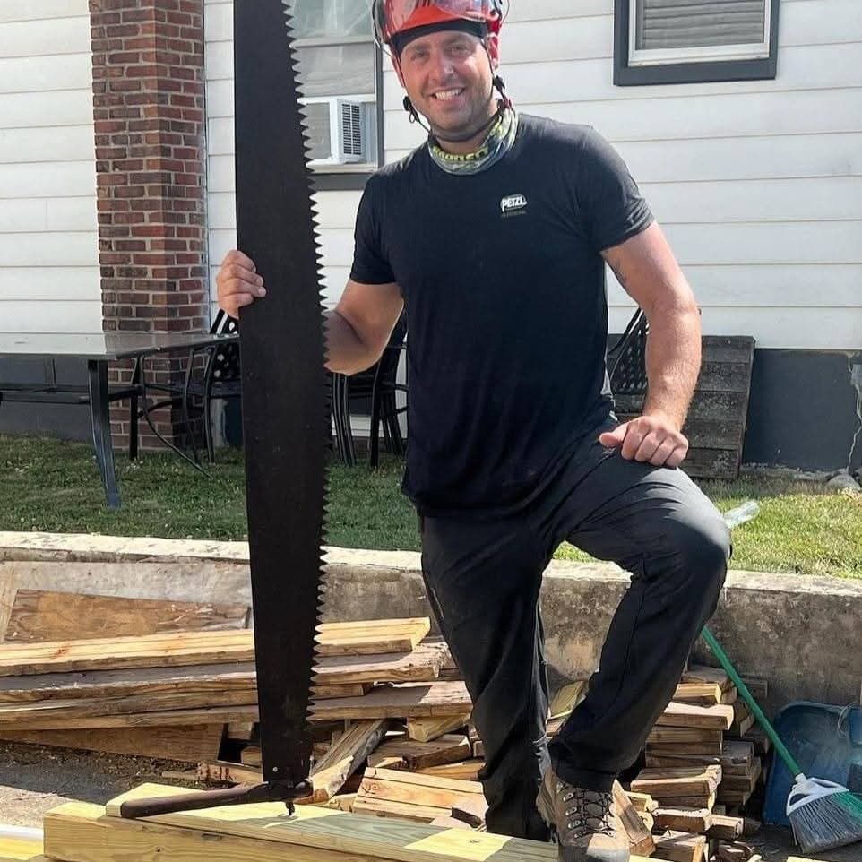Alan R. August owner of Alan's Tree Service holding chainsaw in Hunterdon County NJ